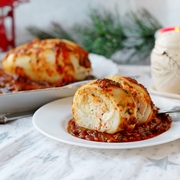 Кальмары, фаршированные рисом в томатном соусе